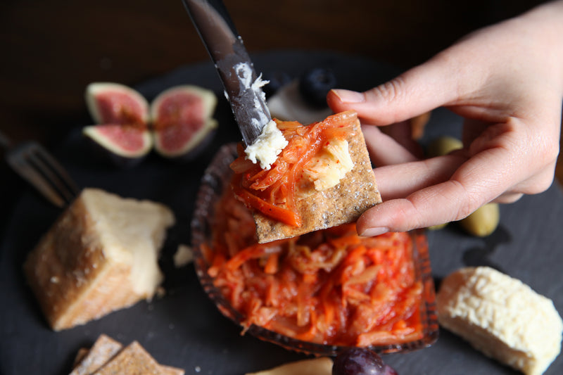 What to eat kimchi with — kimchi on a cracker with cheese and figs, handmade in London by Tangy Affairs