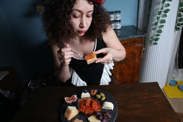 What do you eat kimchi with — founder Leonora serving authentic kimchi on a charcuterie board, handmade in London
